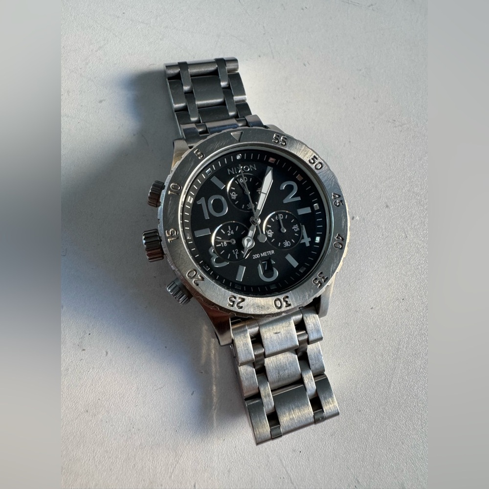 Nixon Men's Silver Stainless Steel Chronograph Watch with Black Dial